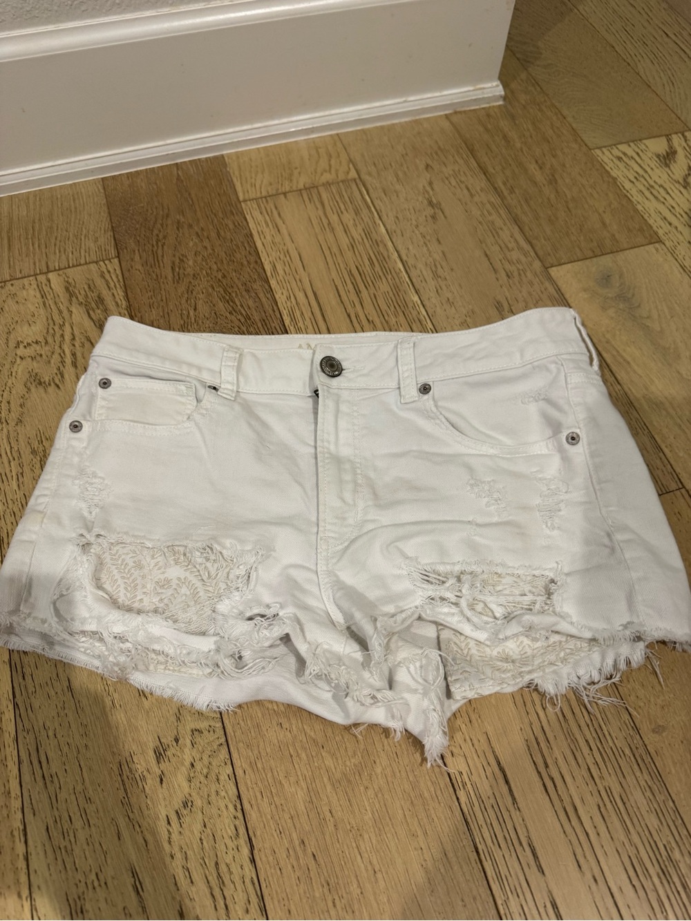 American Eagle Outfitters White Distressed Lace-Trim Jean Shorts